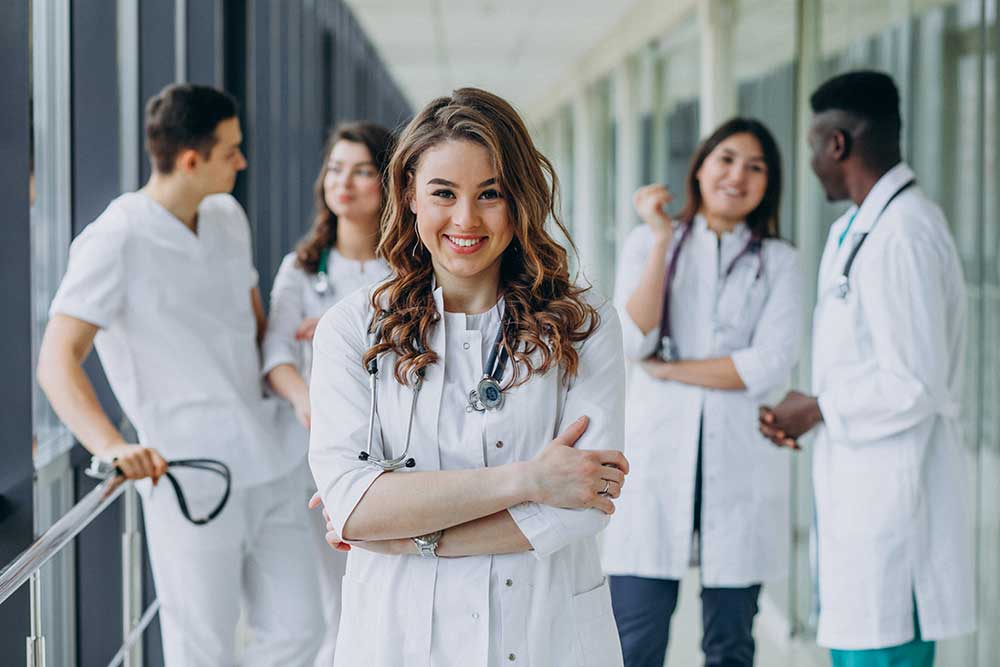 young female doctor posing corridor hospital - صفر تا صد تحصیل در چین 2021-2022